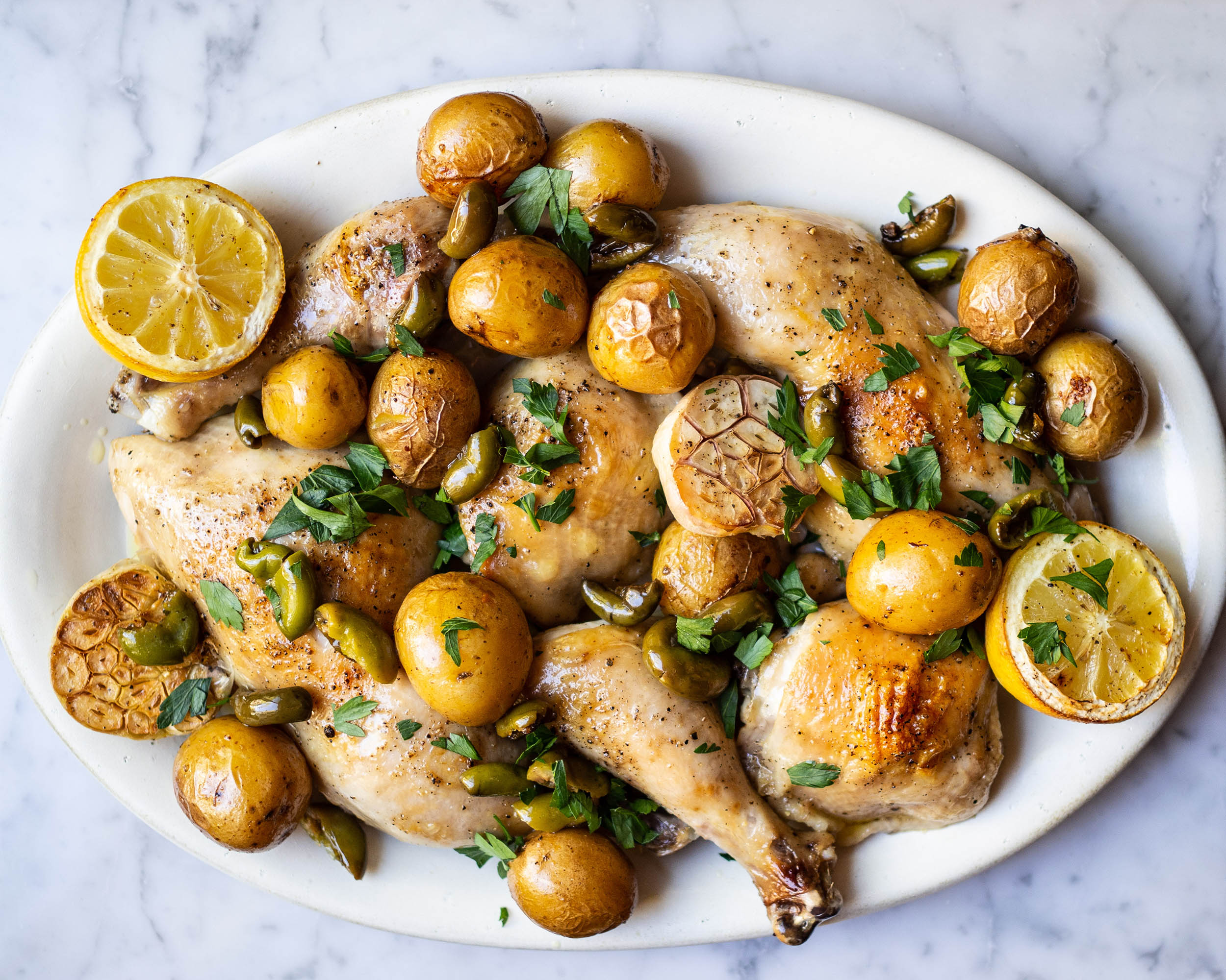 Olive-Oil Confit Chicken with the Lemon, Potatoes, Green Olives + Herbs Image